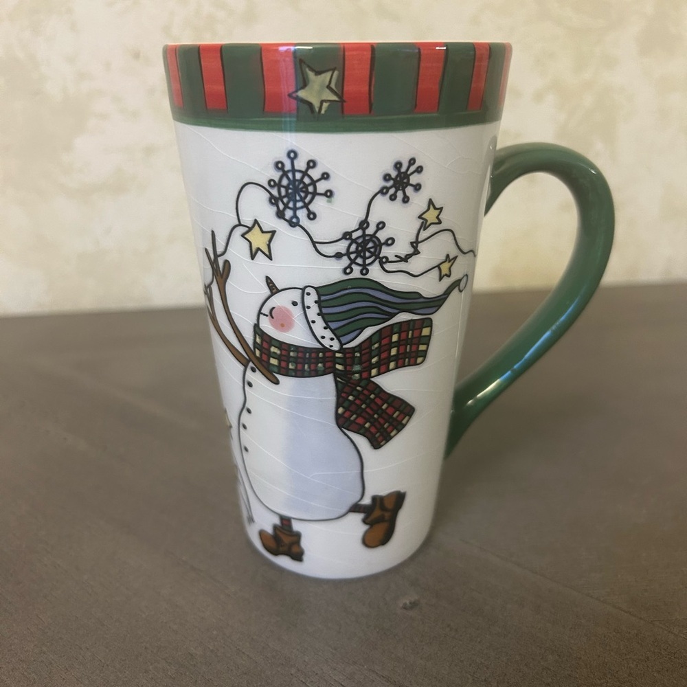 Beautiful 12 oz. Ceramic Snowman mug. It just makes you happy.